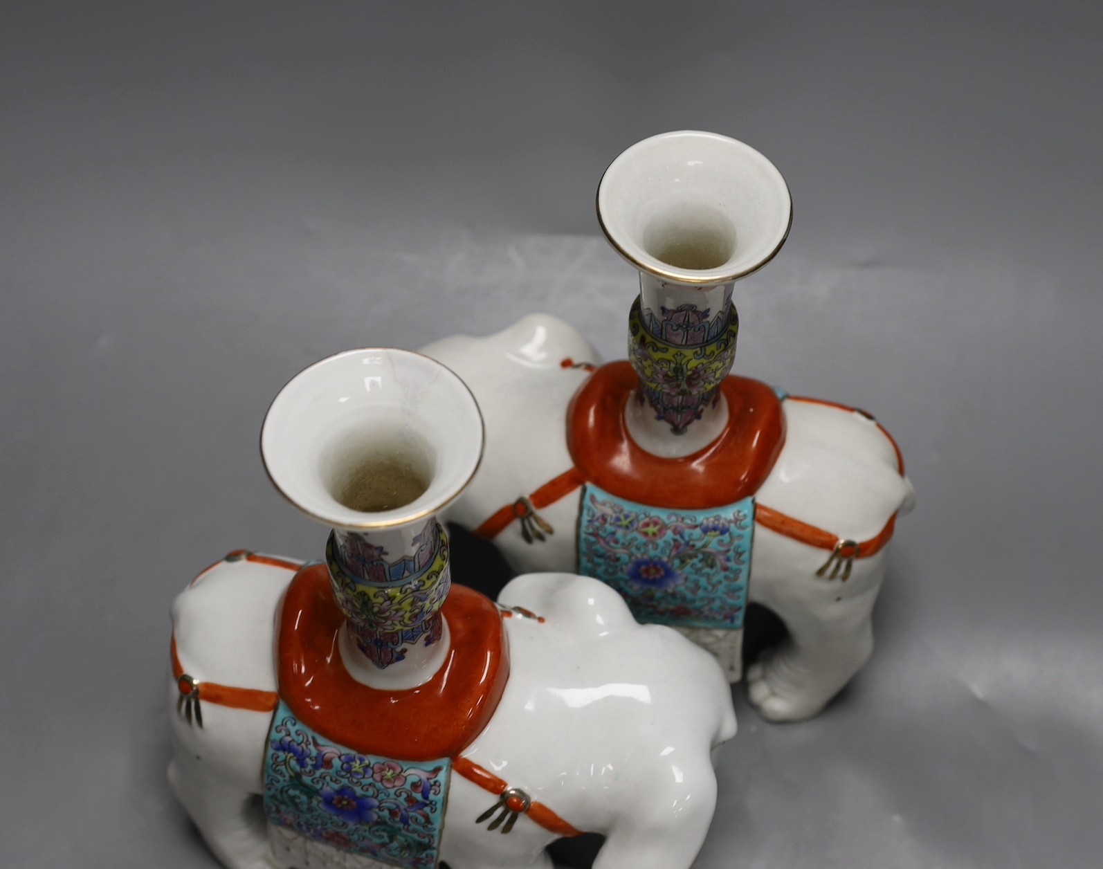A pair of Chinese enamelled porcelain ‘elephant’ vases, 27cm high